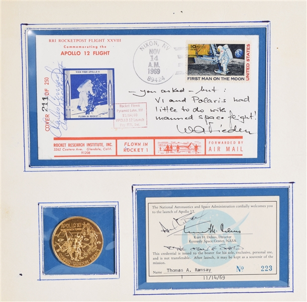 Apollo 12 Collection with piece of Apollo 12 Kapton foil signed by Gordon, Official Launch Card signed by Bean and commemorative envelope signed by Conrad.