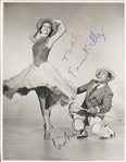 Gene Kelly and Leslie Caron Signed Photo