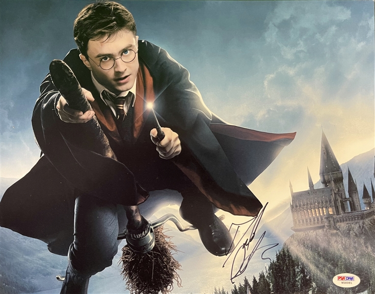11x14 Photo of Harry Potter (Daniel Radcliff) flying on his broom playing quidditch Signed 