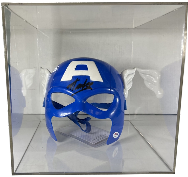 Features a Marvel Captain America mask that has been hand-signed in black felt-tip pen by Stan Lee